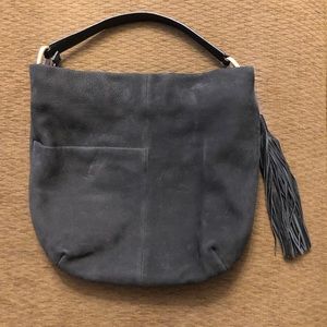 HOBO Black Suede Handbag with outside pocket and tassel